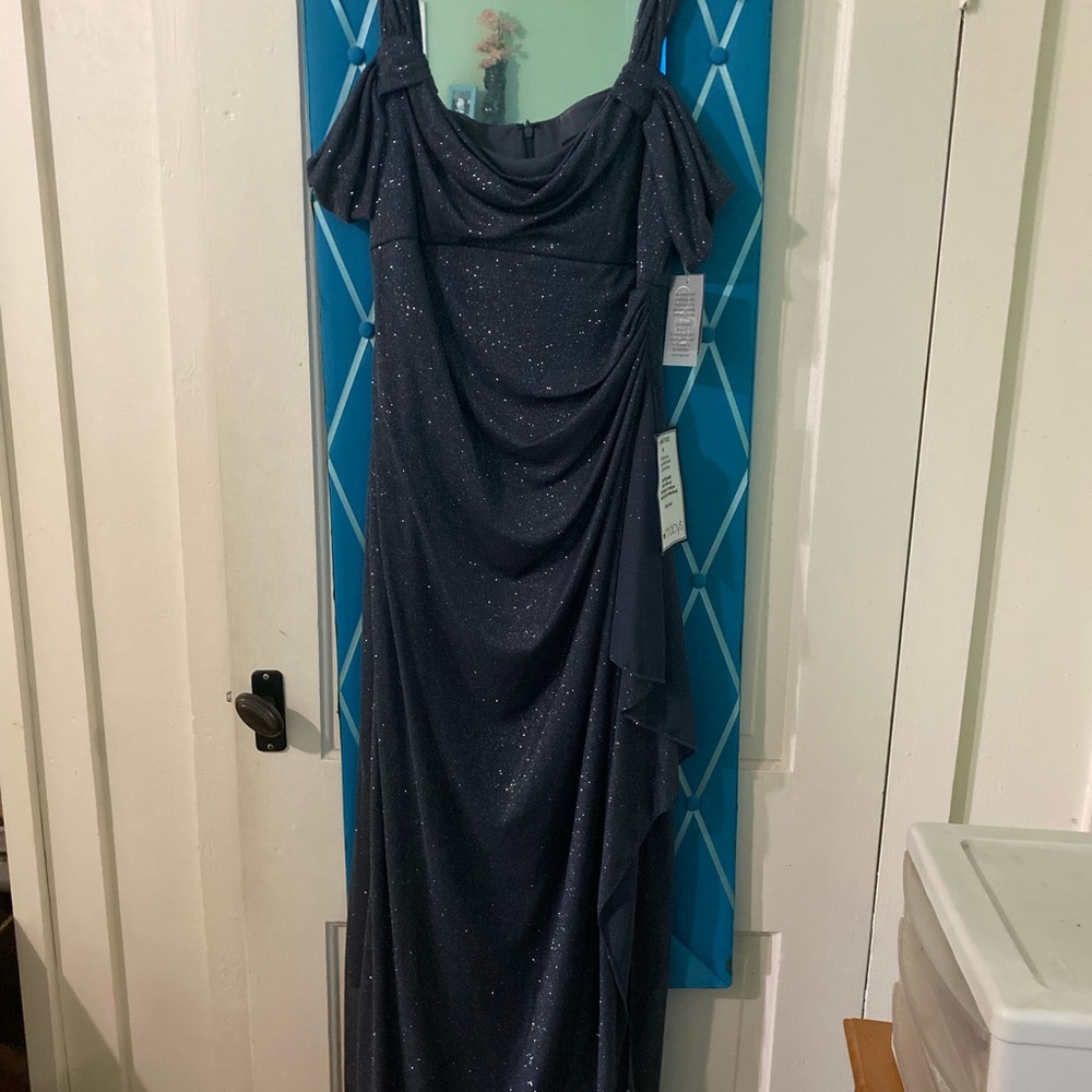 Beautiful smoke full length with peak shoulders or can be hidden as sleeveless